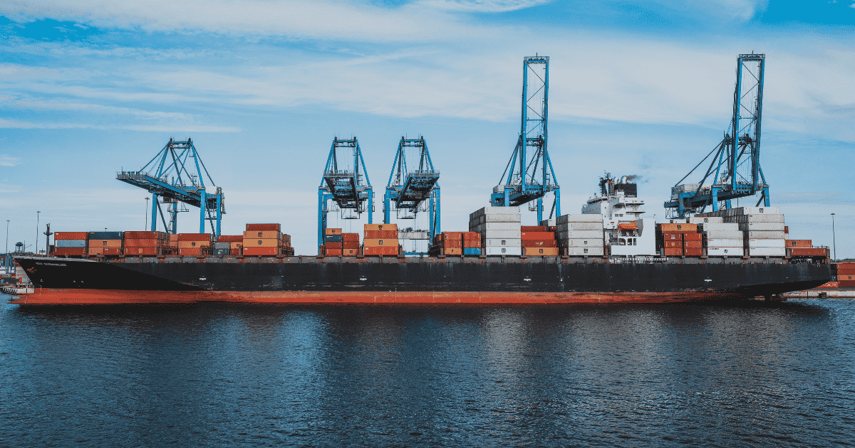 A ship sailing with containers on it